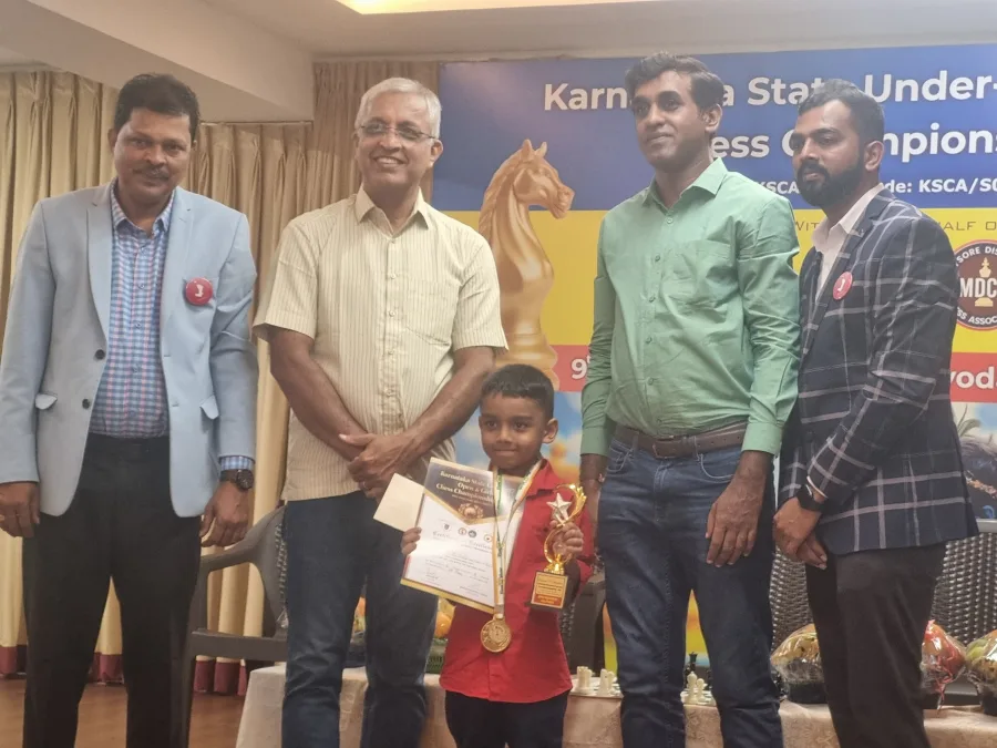 Gahan with a trophy at Karnataka State Chess Championship
